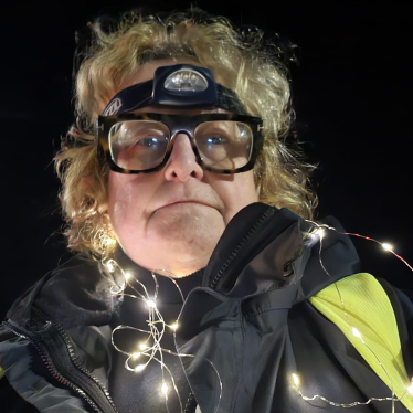 Head shot of Jo Barker in a high-vis